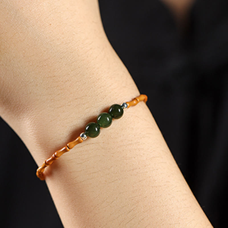 Glücksarmband aus Hetian-Jade und Olivenkern, 6 mm Perlen