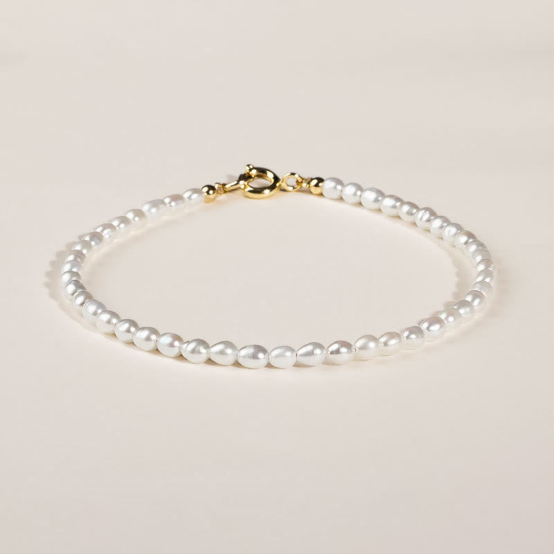 2 mm Naturperle & 14 Karat vergoldetes Weisheitsarmband