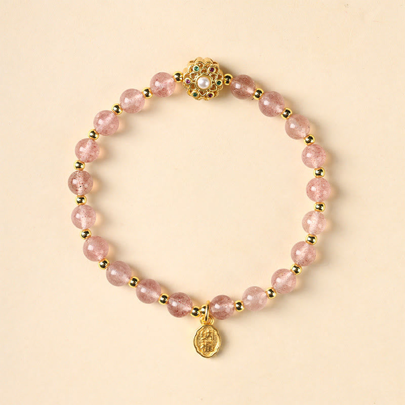 Spirituelles Armband aus 14 Karat Gold mit Erdbeerquarz und Fu-Anhänger