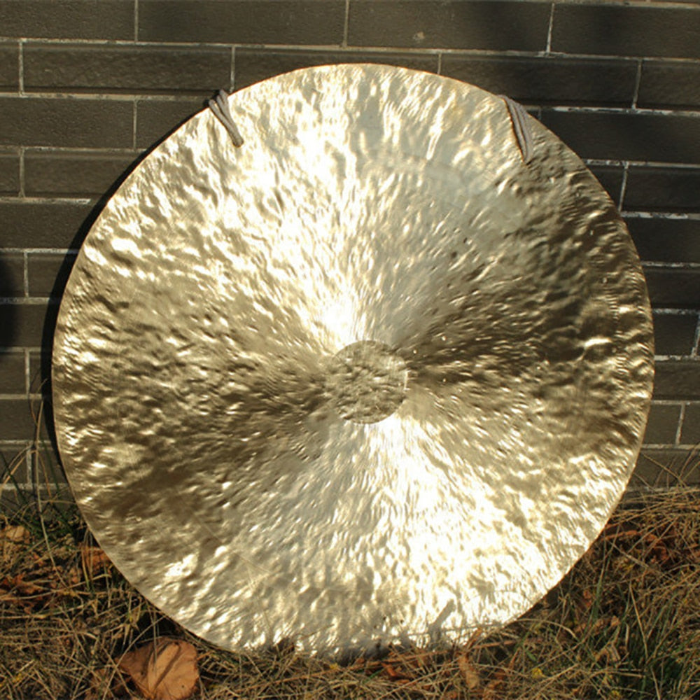 32 Inch Wind Gong Instrument with a hammered metallic texture reflecting light