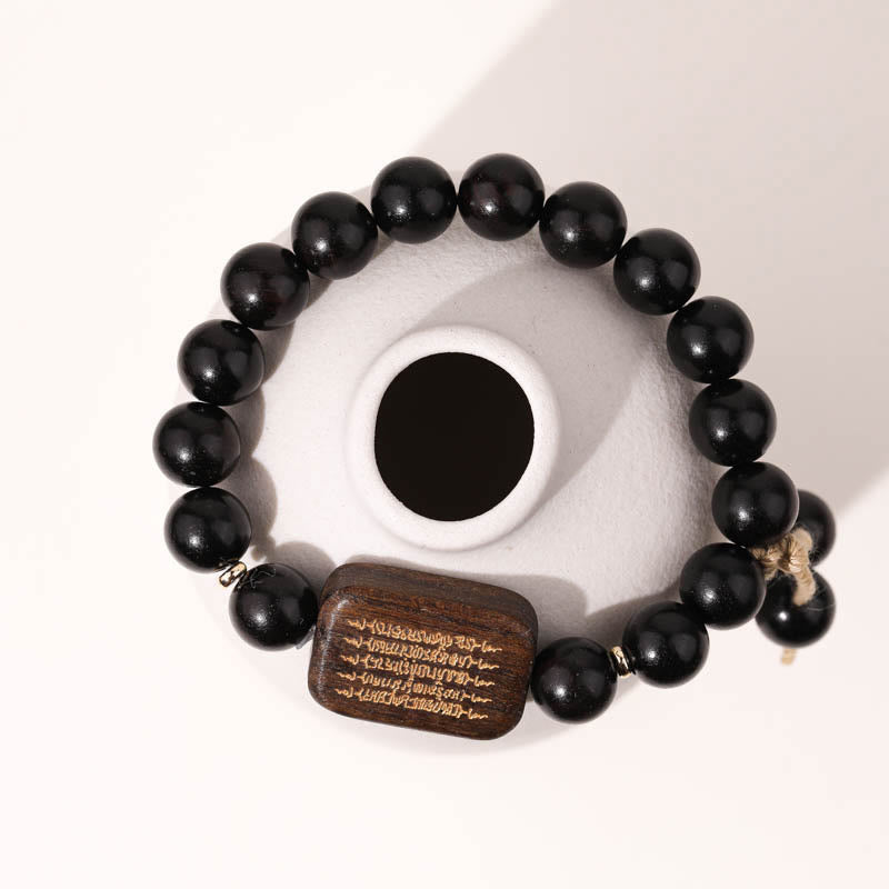 Armband aus Ebenholz mit eingraviertem Schriftzug „Peace“ 14–17 cm