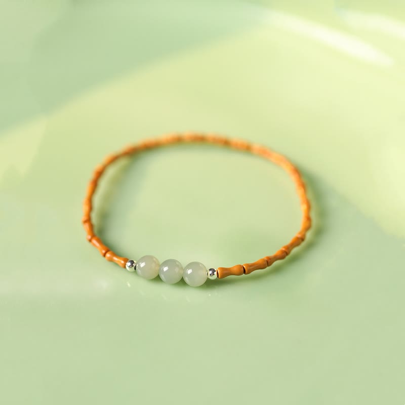 Glücksarmband aus Hetian-Jade und Olivenkern, 6 mm Perlen