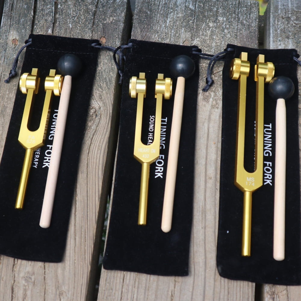 Gold tuning forks with black velvet pouches in 3pc Solfeggio Tuning Fork Set