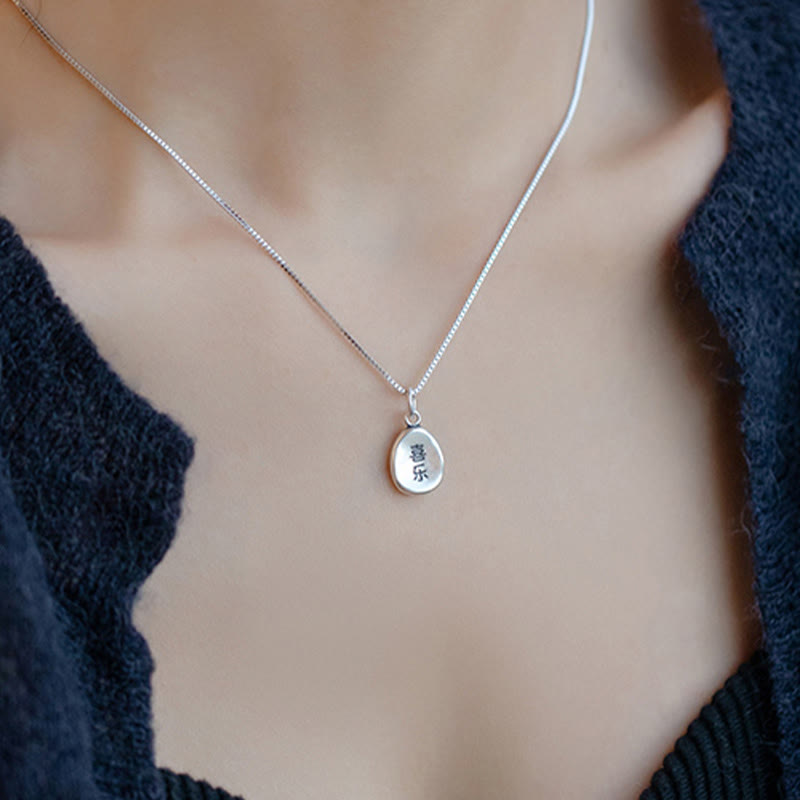 Spirituelle Halskette aus 999er Sterlingsilber mit Peace Joy Fu-Anhänger