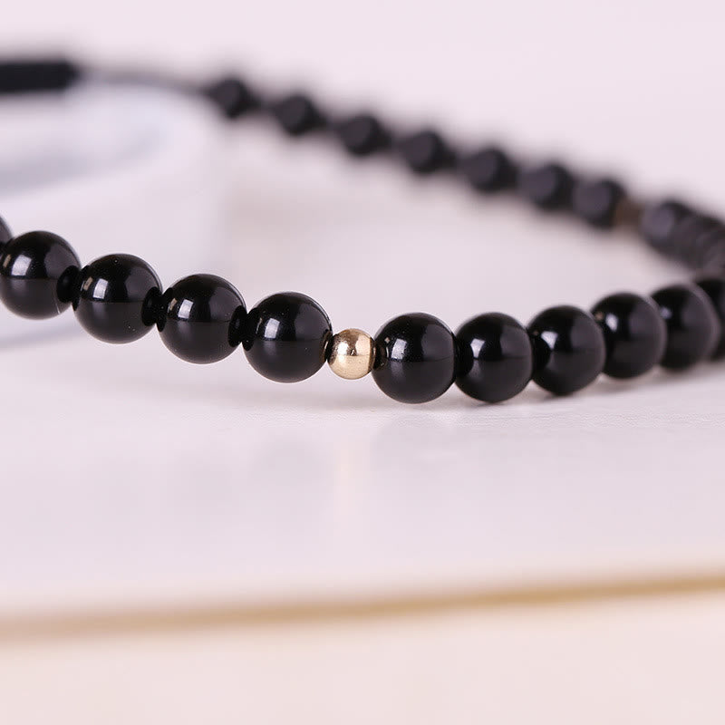 4 mm schwarzes Obsidian-Schutzseilarmband