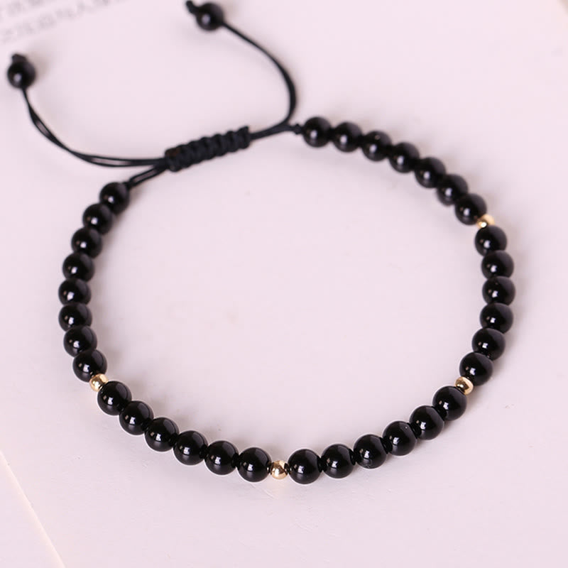 4 mm schwarzes Obsidian-Schutzseilarmband
