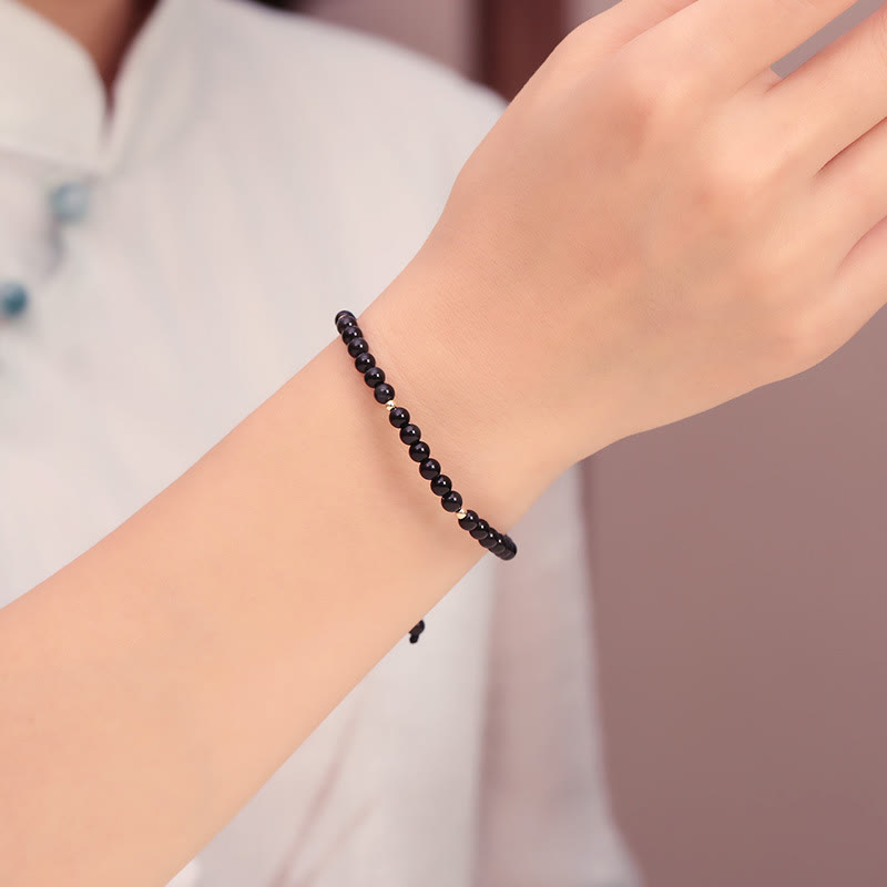 4 mm schwarzes Obsidian-Schutzseilarmband