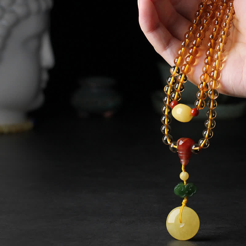 Mala-Armband mit 108 Perlen aus Citrin und Bernstein für den Frieden