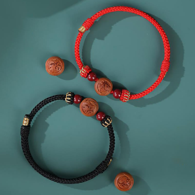 Natürliches Pfirsichholz Chinesisches Sternzeichen Fu Zinnober Reichtum Armband