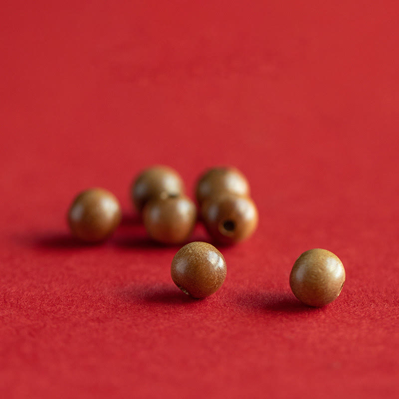 Zinnober-Lotusarmband aus Pfirsichholz für Glück und Reichtum