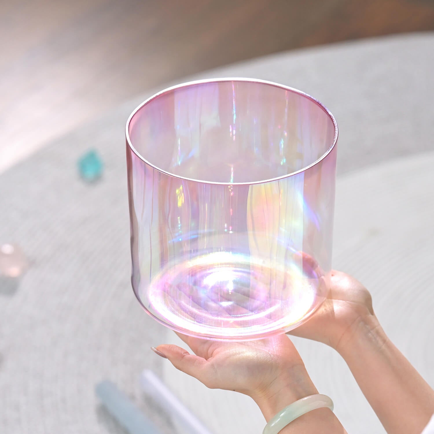 Iridescent Pink Aura Quartz Singing Bowl for Meditation with rainbow reflections