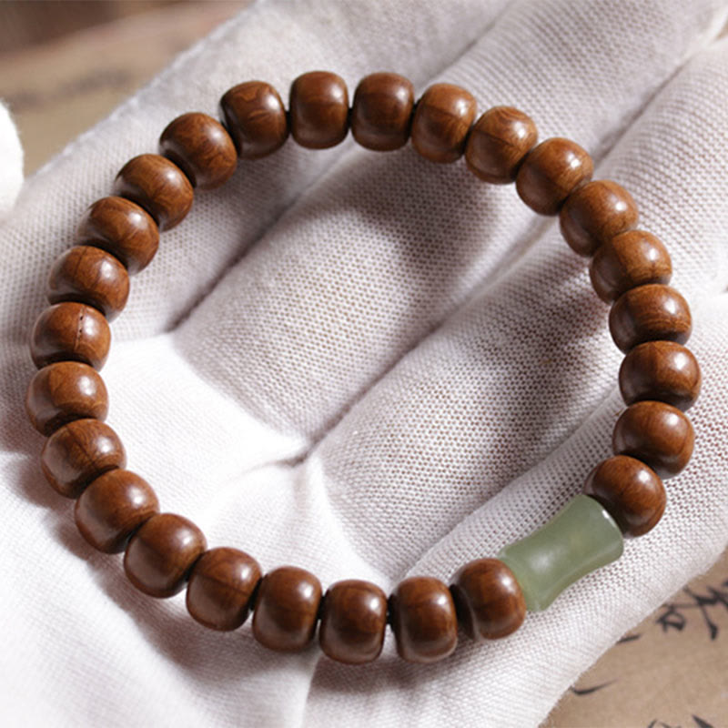 6*8mm Abelia Biflora Holz & Hetian Jade Schutzarmband