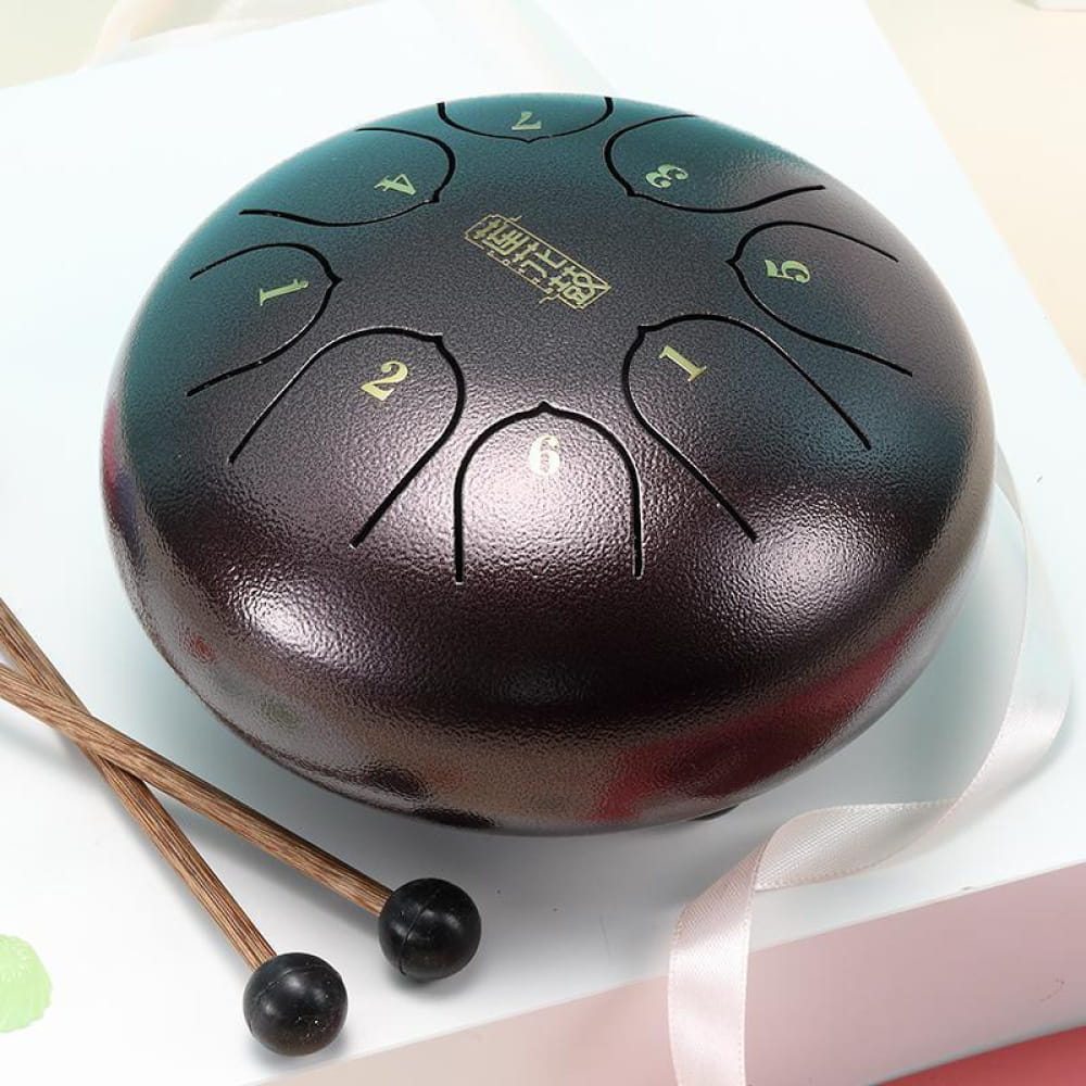 Dark metallic 6 inch Carbon Steel Tongue Drum with etched tone markers and two mallets