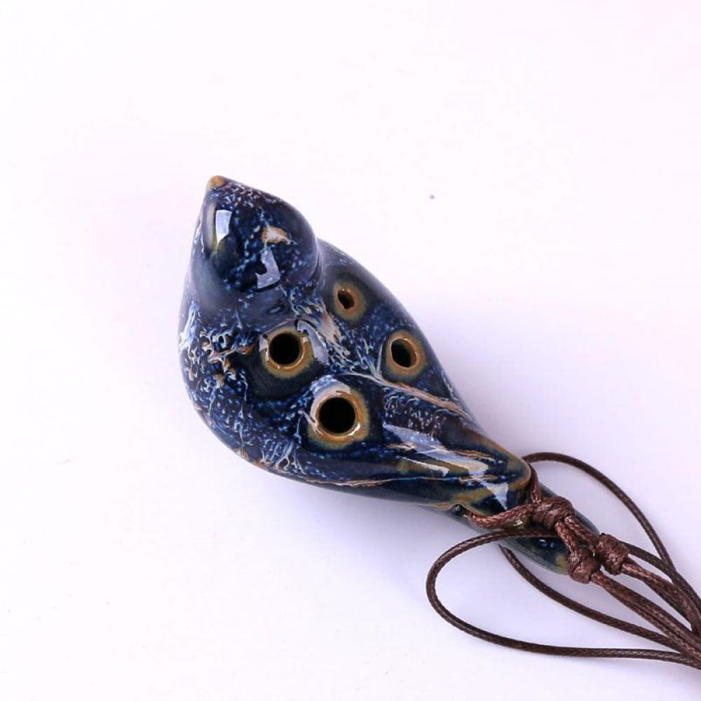 Dark blue ceramic 6 Hole Alto C Ocarina Pendant with decorative cracks and finger holes
