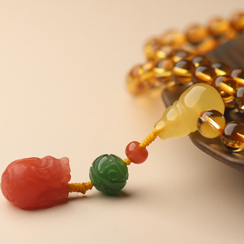 Mala-Armband mit 108 Perlen aus Citrin und Bernstein für den Frieden