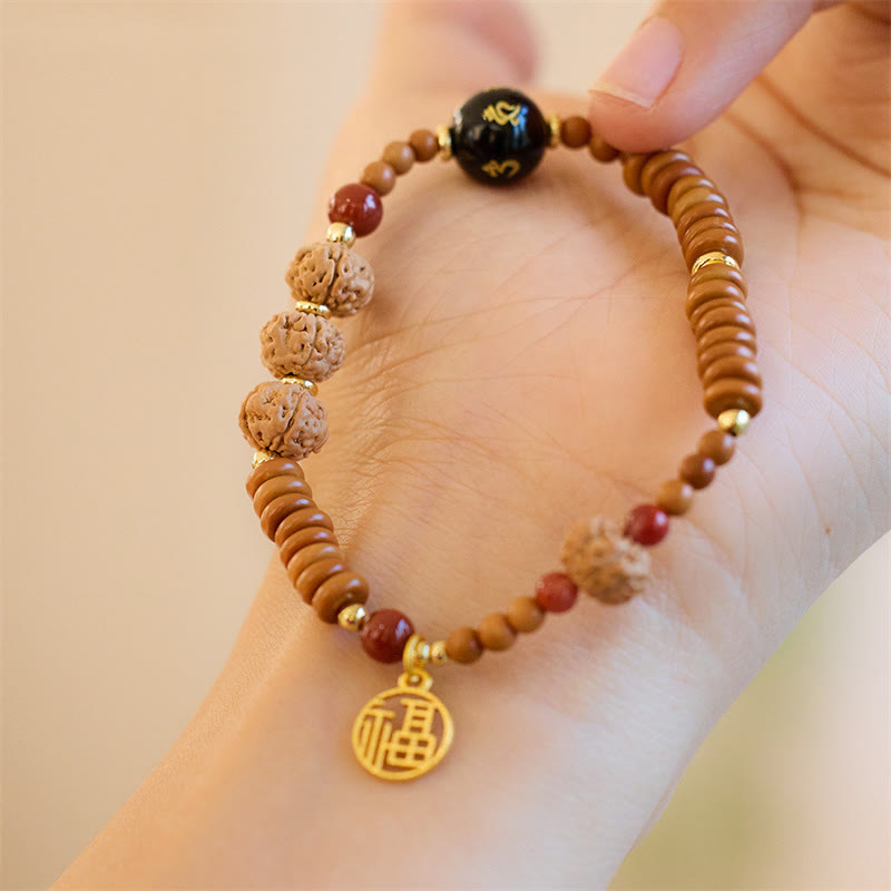 Om Mani Padme Hum Armband Bodhi Seed und schwarzer Onyx
