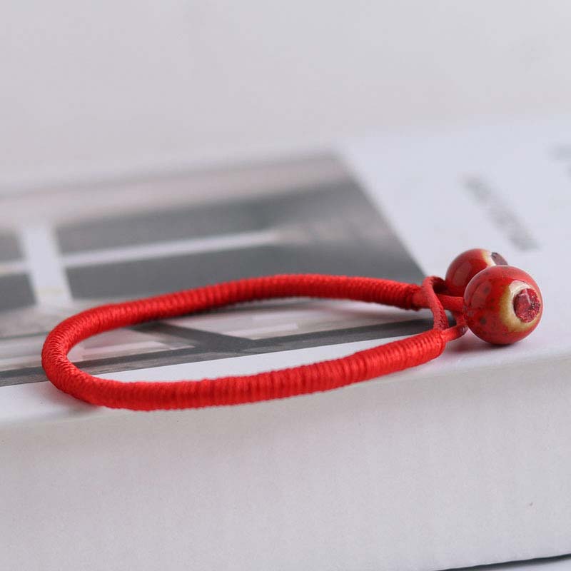 Verstellbares FengShui-Armband mit roter Schnur für Glück und Schutz