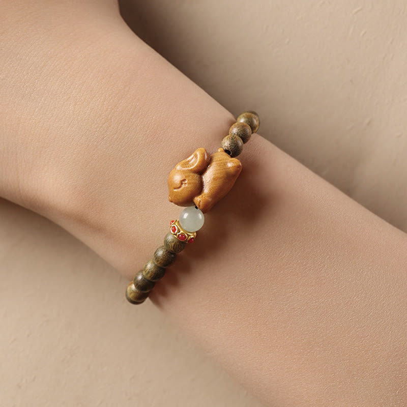 6 mm grünes Sandelholz-Armband mit positivem Kaninchen