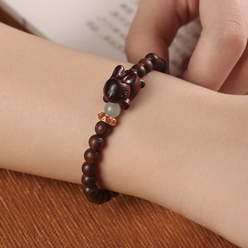 6 mm grünes Sandelholz-Armband mit positivem Kaninchen