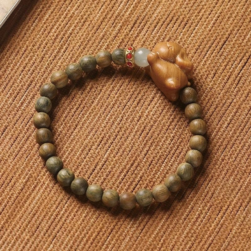 6 mm grünes Sandelholz-Armband mit positivem Kaninchen
