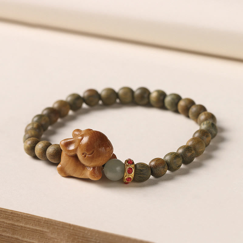 6 mm grünes Sandelholz-Armband mit positivem Kaninchen