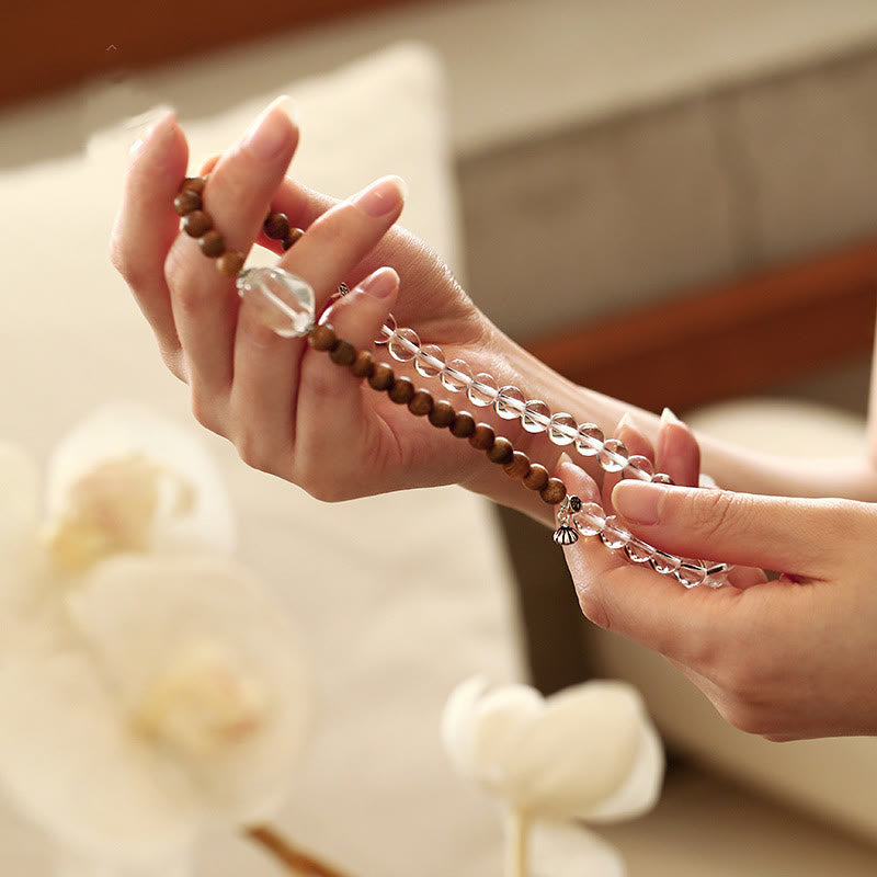 6 mm weißes Kristall-Adlerholz-Lotusarmband für Ruhe und Heilung