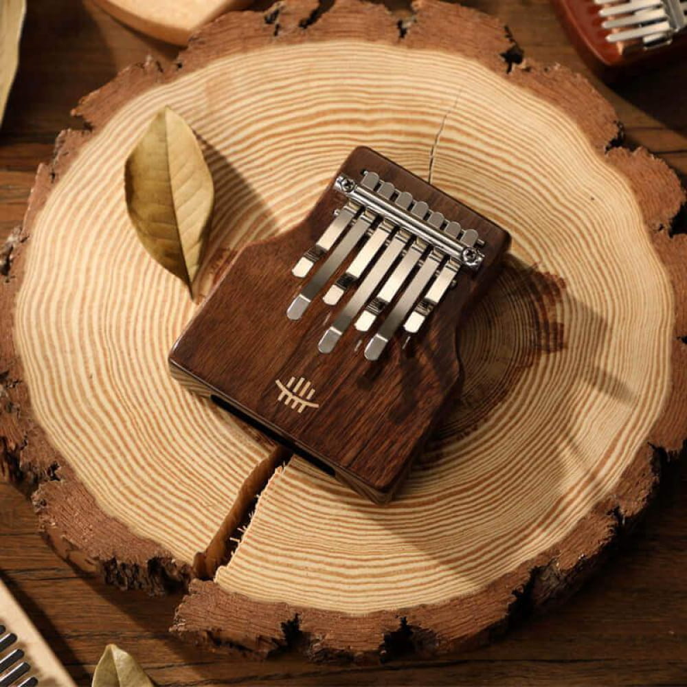 Wooden 7-Key C Tone Thumb Piano with metal tines and resonance hole for portable music