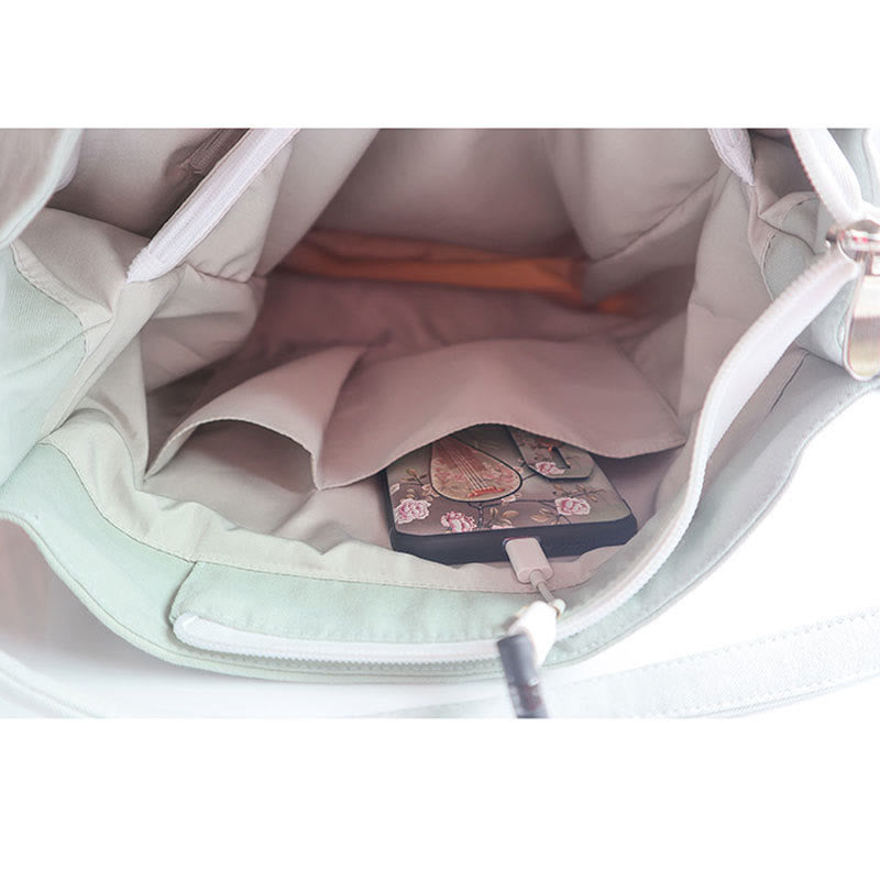 Canvas-Tragetasche mit Blumenkranich- und Pflaumenblüten-Stickerei