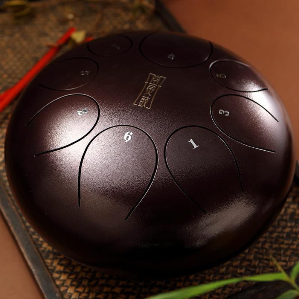 Dark metallic 8 inch steel tongue drum with numbered tone zones, F key for children