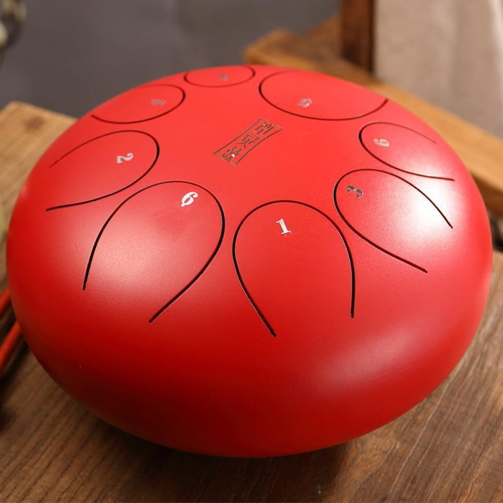 Red Steel Tongue Drum with numbered tone zones for 8 Note F Key, ideal for children