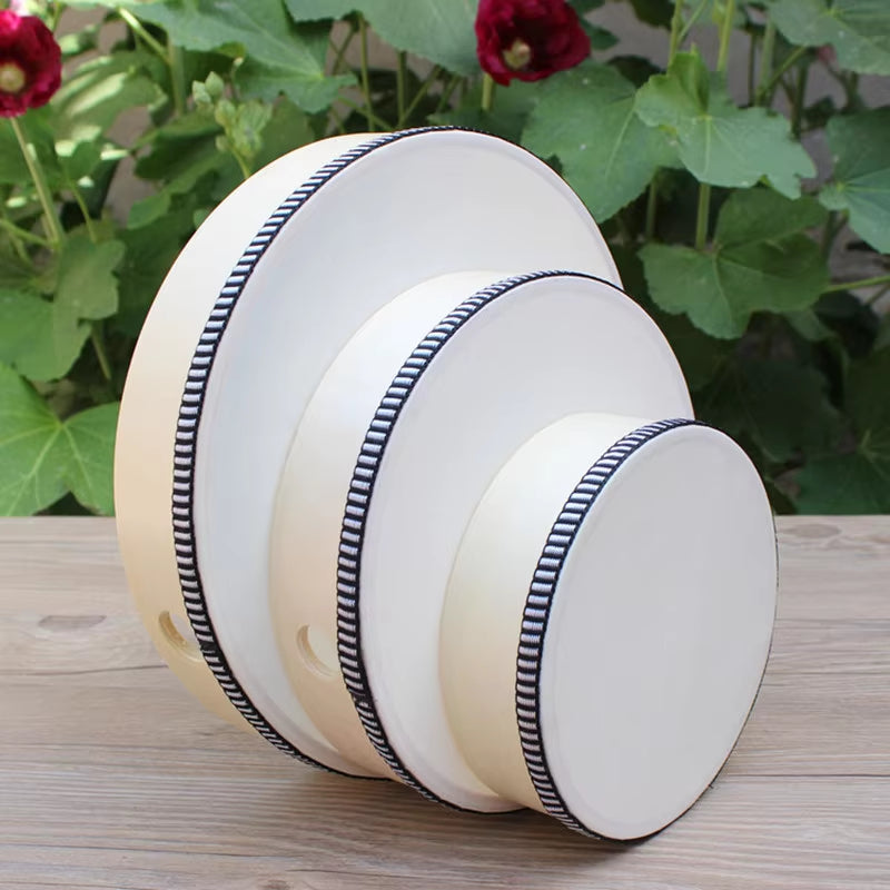 White ceramic plates with navy blue striped trim in 8-Inch Wooden Frame Drum for Kids