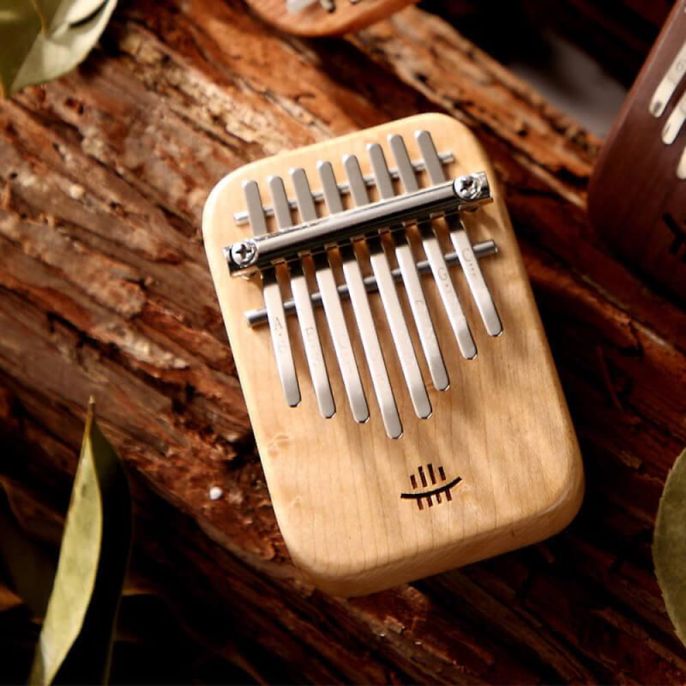 Wooden 8 Key Maple C Tone Kalimba Thumb Piano with metal tines in compact design
