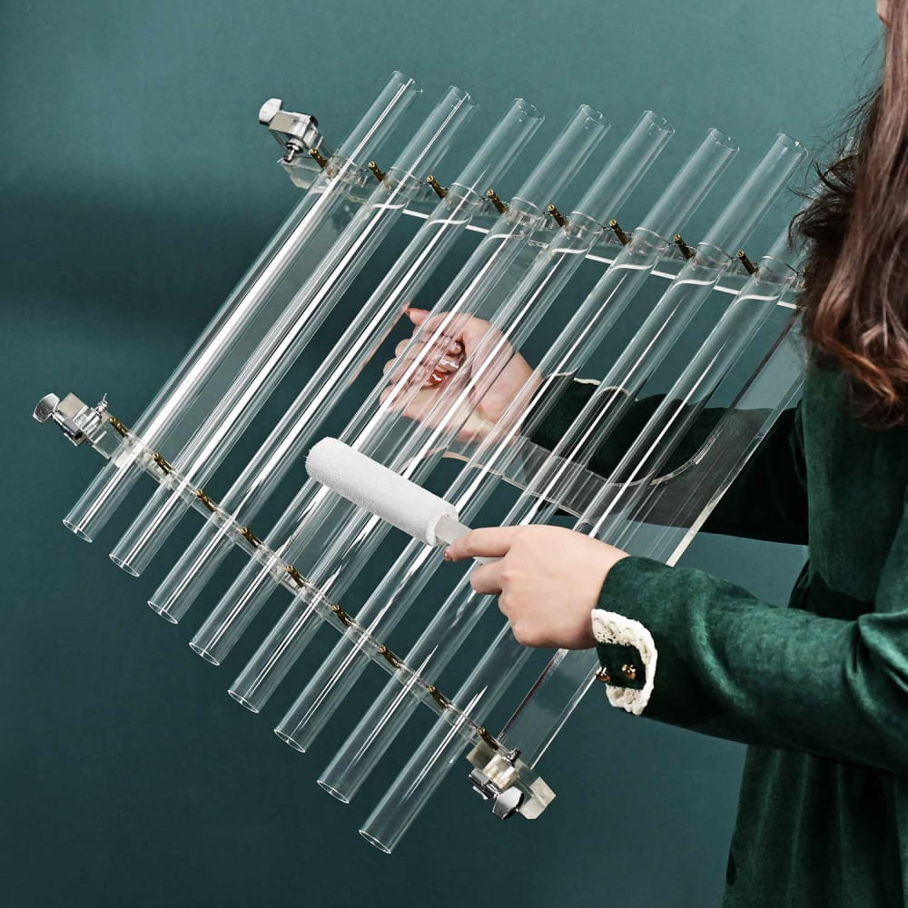 Glass xylophone made of transparent tubes on frame in 8-Note Quartz Crystal Singing Harp