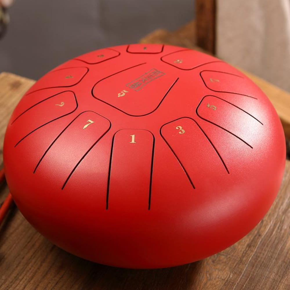 Red steel tongue drum with numbered sections, 8 inch, 11 notes in F key
