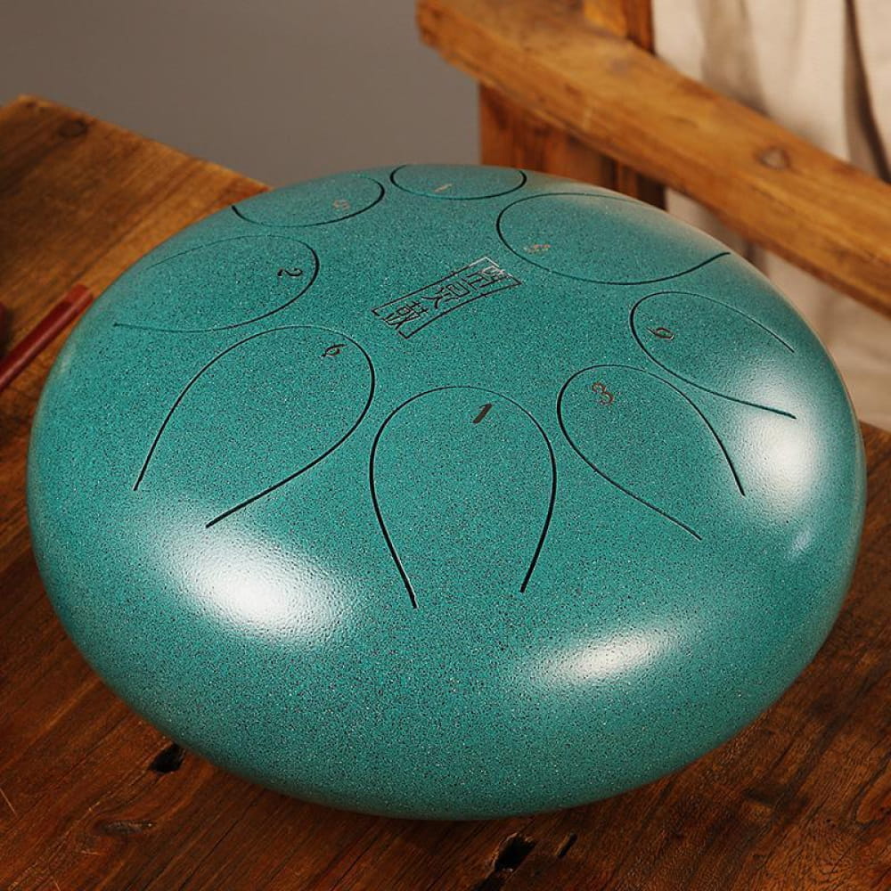 Turquoise 8-Tone C Key Alloy Steel Tongue Drum with petal-shaped tone markings