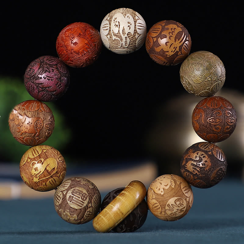 Chinesisches Sternzeichen-Armband aus Rosenholz mit geschnitzter Kupfermünze für Ruhe