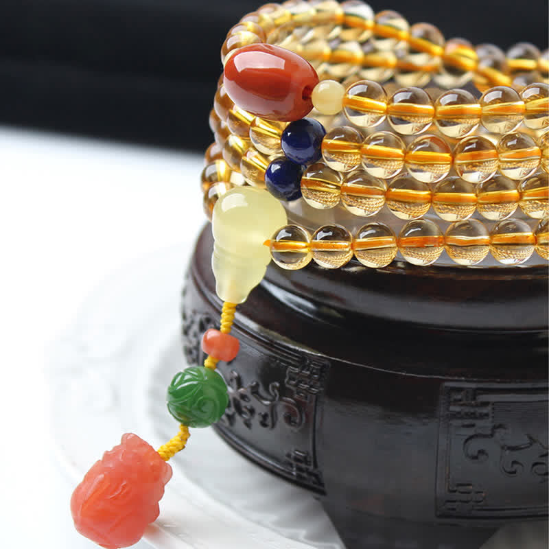 Mala-Armband mit 108 Perlen aus Citrin und Bernstein für den Frieden