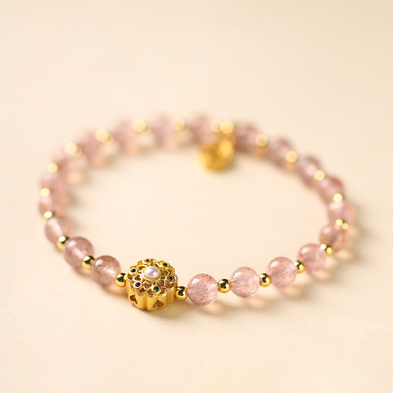 Spirituelles Armband aus 14 Karat Gold mit Erdbeerquarz und Fu-Anhänger