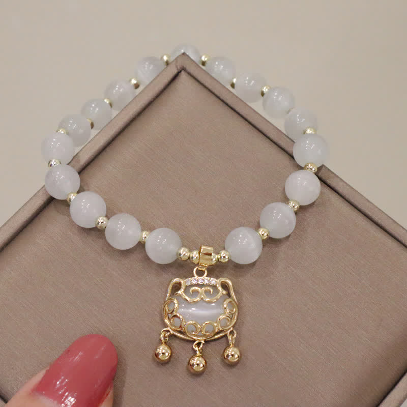 8 mm Katzenaugen-Perlen-Liebes-Charm-Armband für Ruhe und Frieden