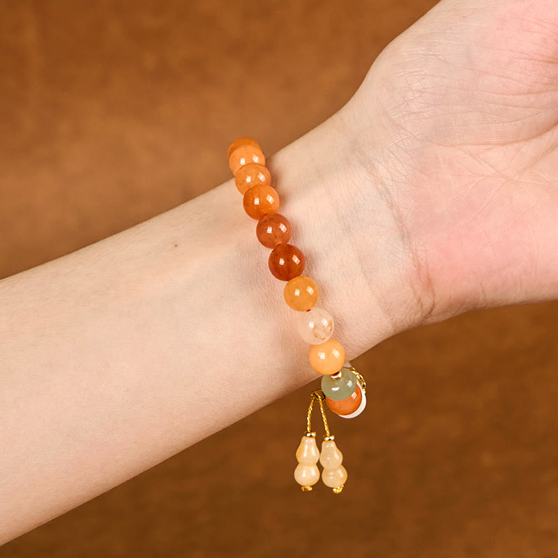 8 mm goldenes Seidenarmband mit Jade und weißem Kristall für Glück