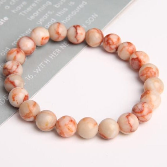 8 mm spirituelles Armband mit rotem Linienkristall