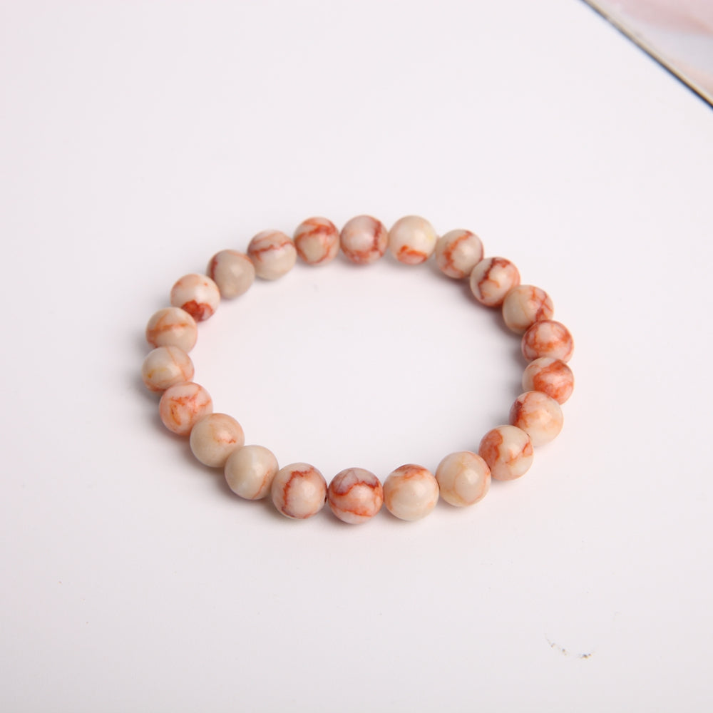 8 mm spirituelles Armband mit rotem Linienkristall