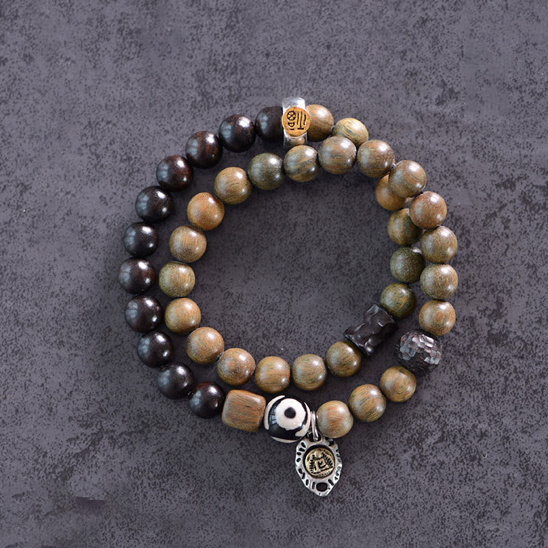8 mm spirituelles Armband aus tibetischem Ebenholz und grünem Sandelholz