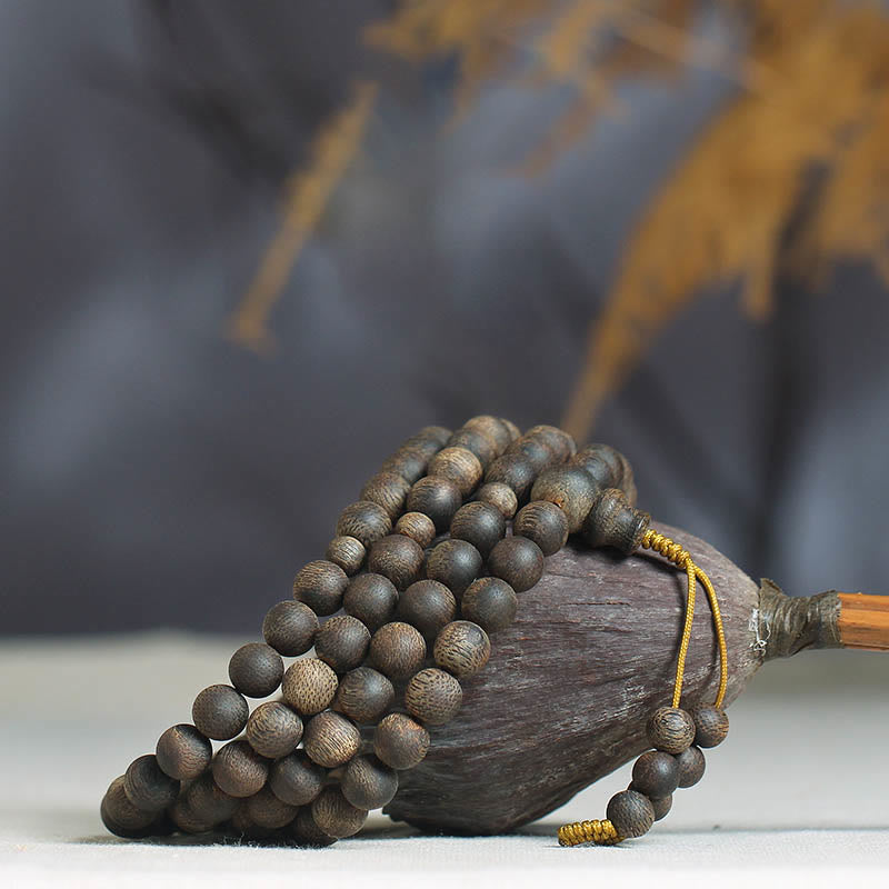 8 mm weißes Mala-Armband aus Qinan-Adlerholzholz für Frieden und Stärke