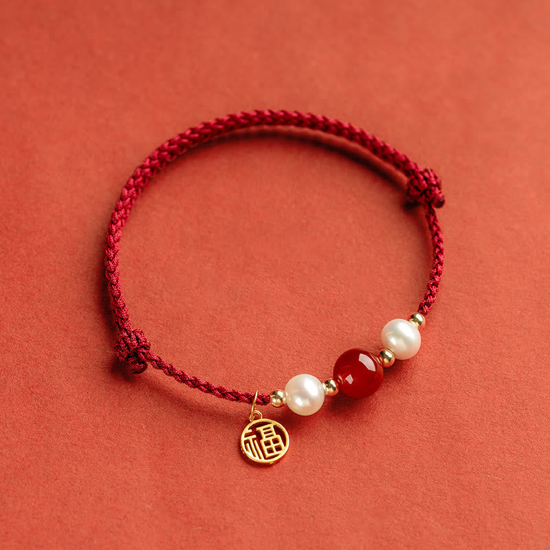 Rotes Schnurarmband aus 925er Sterlingsilber mit Fu-Charakter