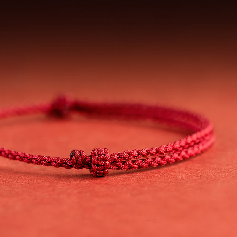 Rotes Schnurarmband aus 925er Sterlingsilber mit Fu-Charakter