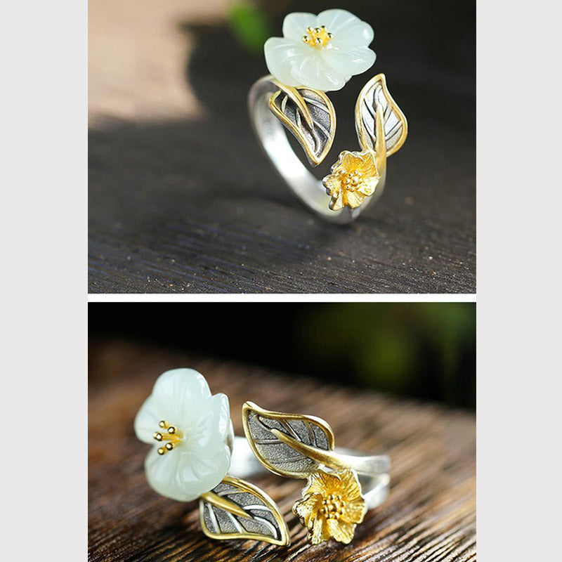 Unisex-Glücksring aus weißer Jade mit 925 versilberter Pflaumenblüte aus Kupfer