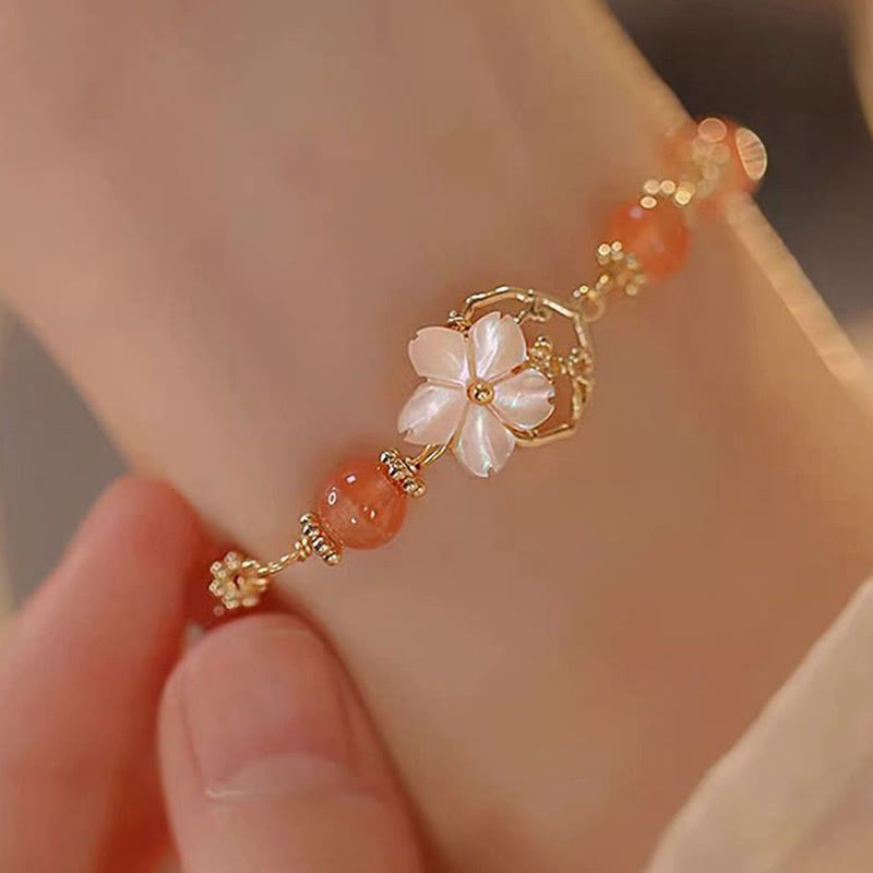 Rotes Achat-Tridacna-Selbstvertrauensarmband für ruhige Stärke