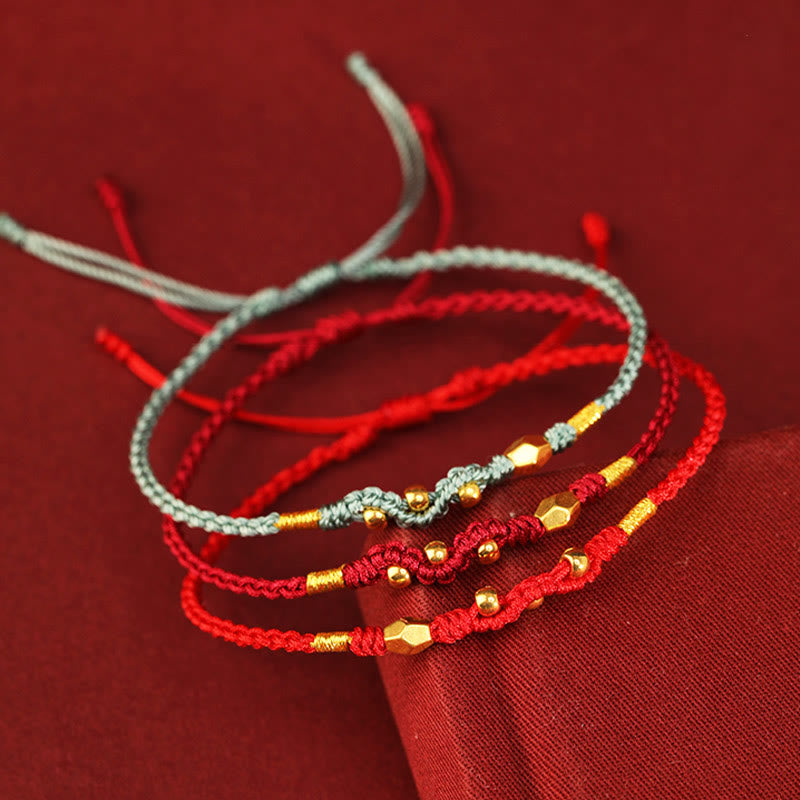 999 Gold Schlangen-Schutzarmband mit roter Schnur