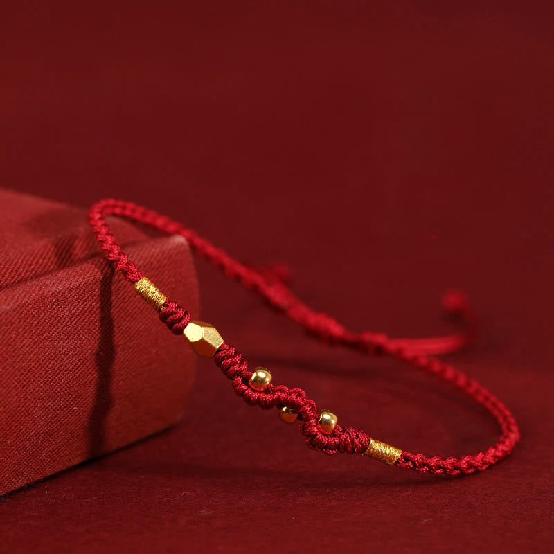 999 Gold Schlangen-Schutzarmband mit roter Schnur